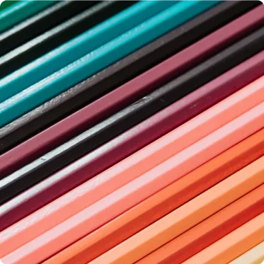 Rows of brightly coloured pencils