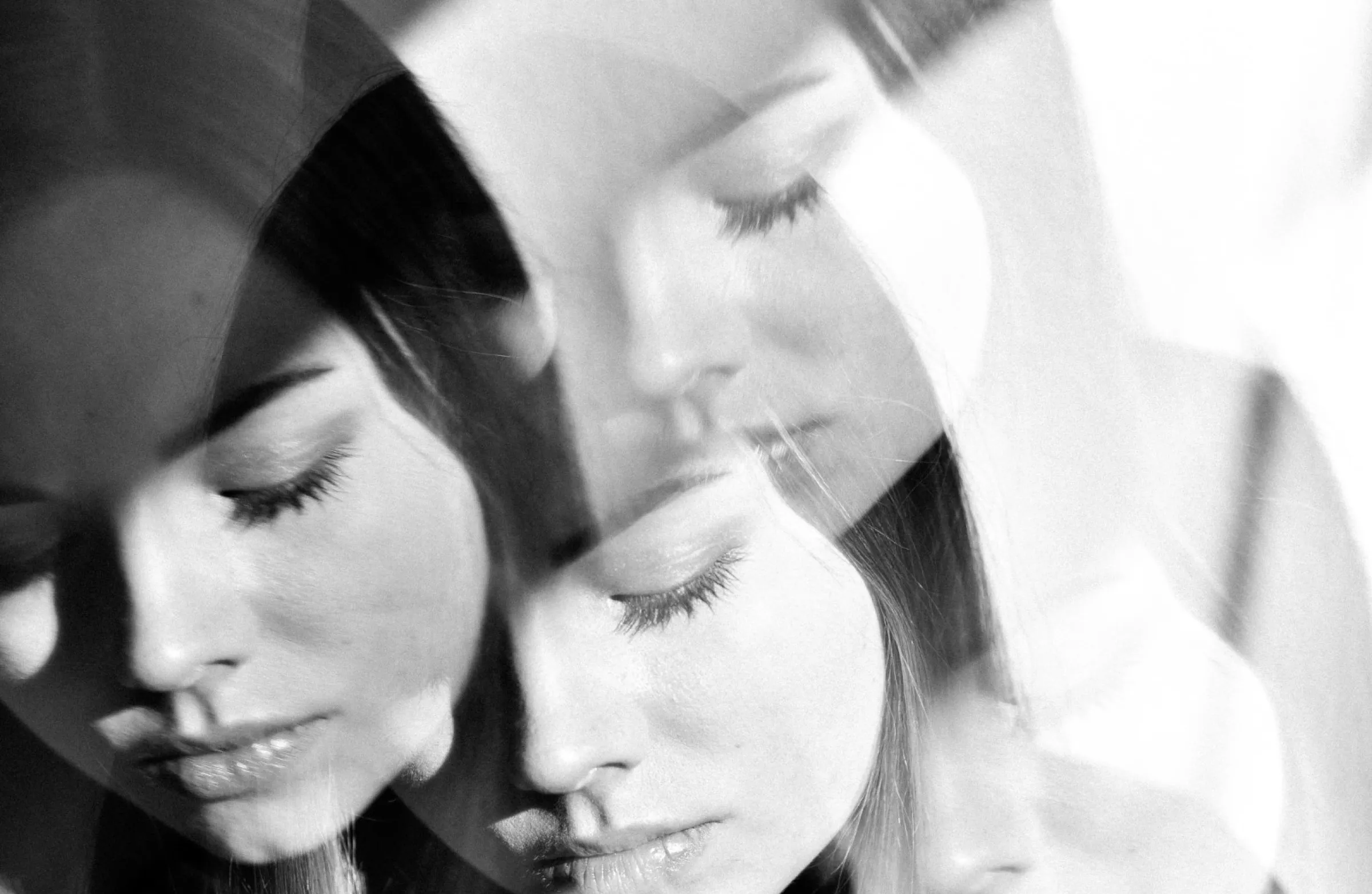 Multiple overlapping exposures of a woman's face